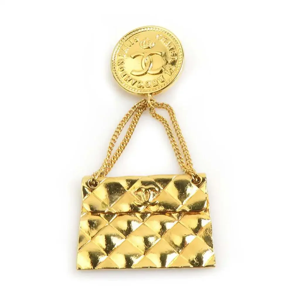 CHANEL Gold Logo Brooch
